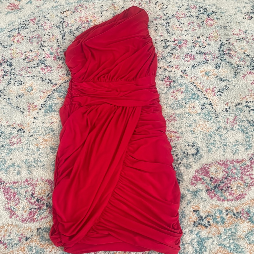 Asymmetrical short red dress in size small.